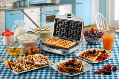 https://decora-group.ams3.cdn.digitaloceanspaces.com/domus/media/75320/conversions/ariete-1973-waffle-maker-party-time-01-rosso-5a1ffb396c4d5c692867a0e01865d1ff.large.webp